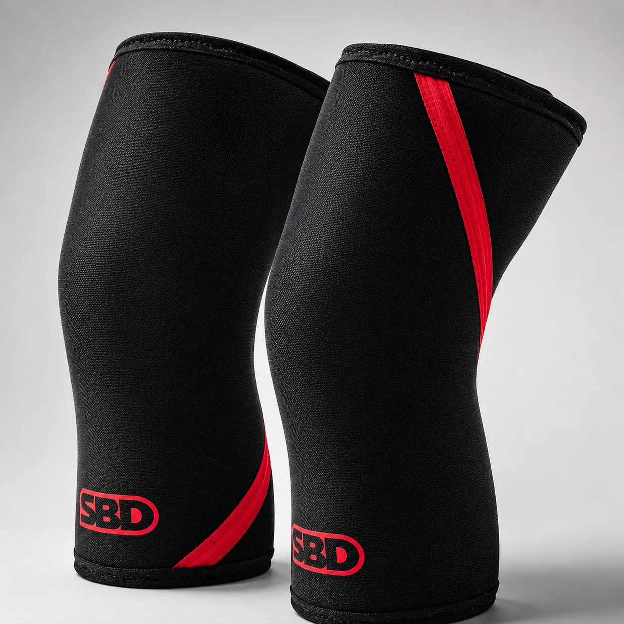 SBD 7mm Training Knee Sleeves in black and red